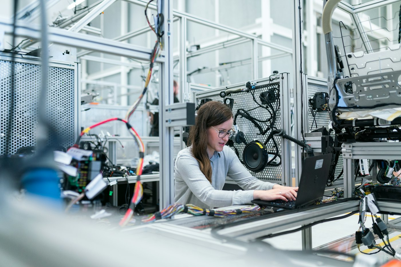 Engineer at a workstation in a production lab